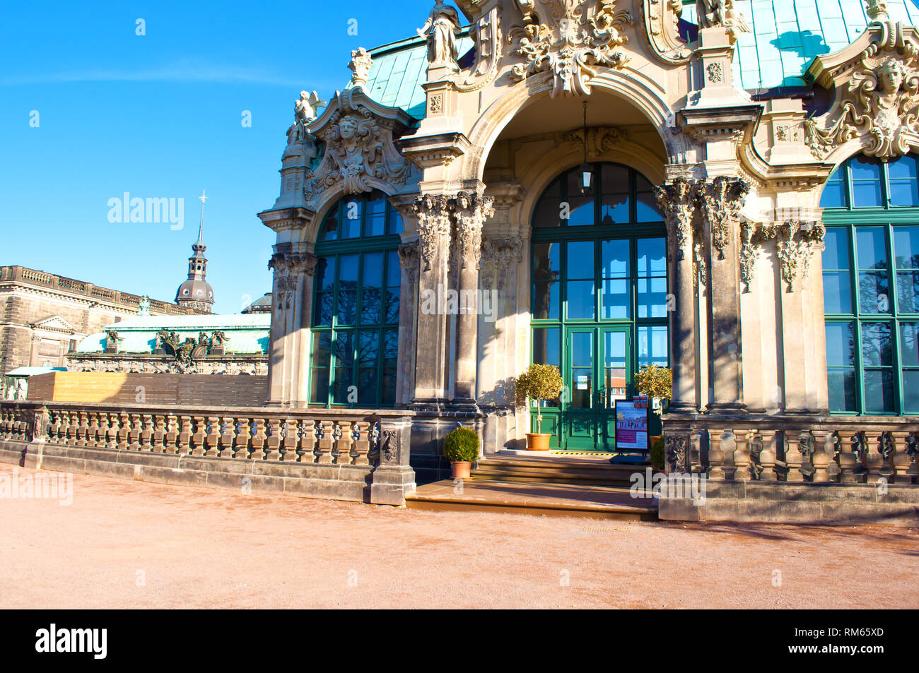 Upper floor of Zwinger gallery, Dresden, Germany. Picturesque Baroque architectural  buildings. Cloudless spring day. Stock Photo