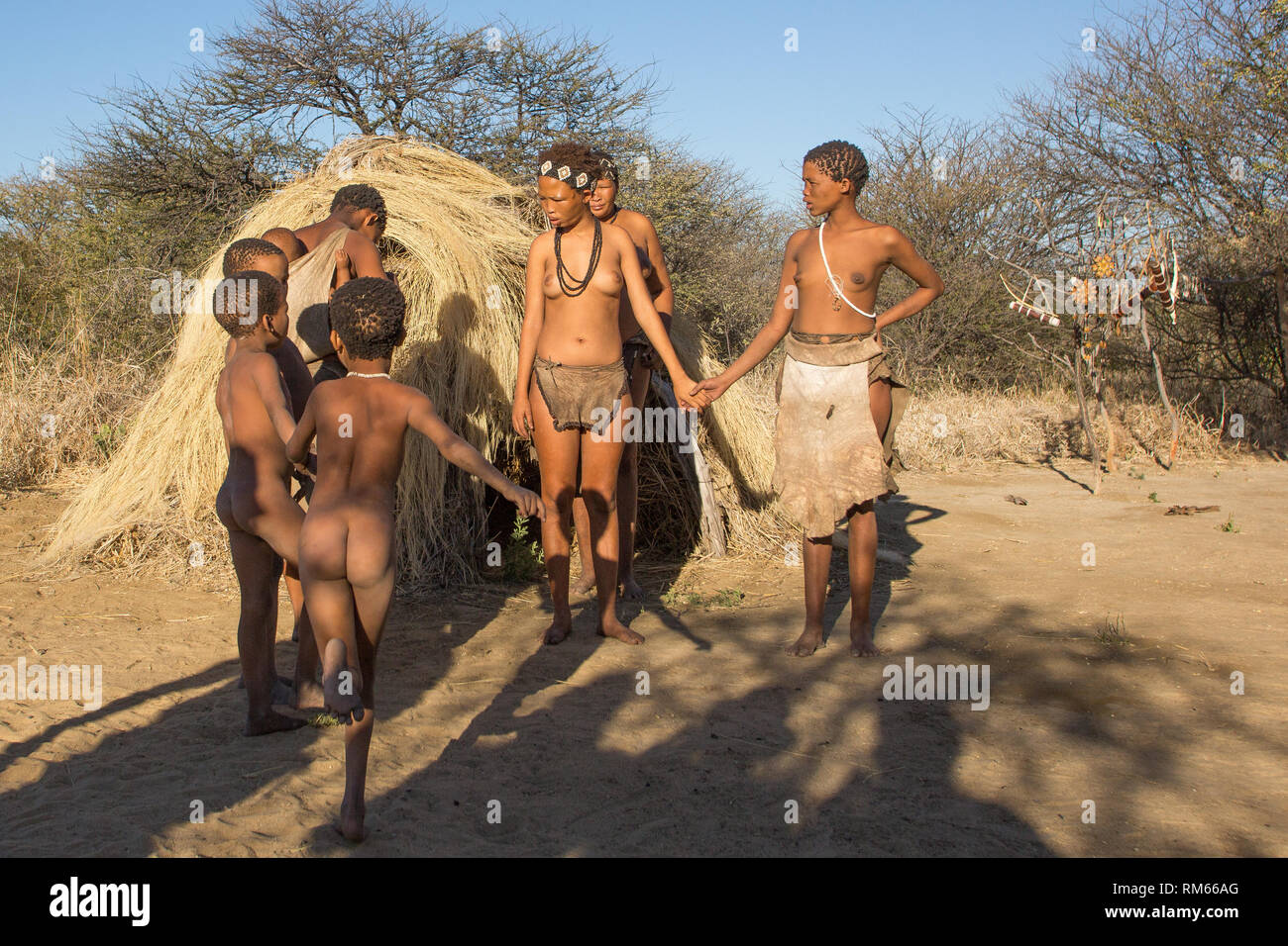 Bushman, Kalahari Desert, Namibia. The Bushmen are indigenous people of southern Africa that span areas of South Africa, Zimbabwe, Lesotho, Mozambique Stock Photo