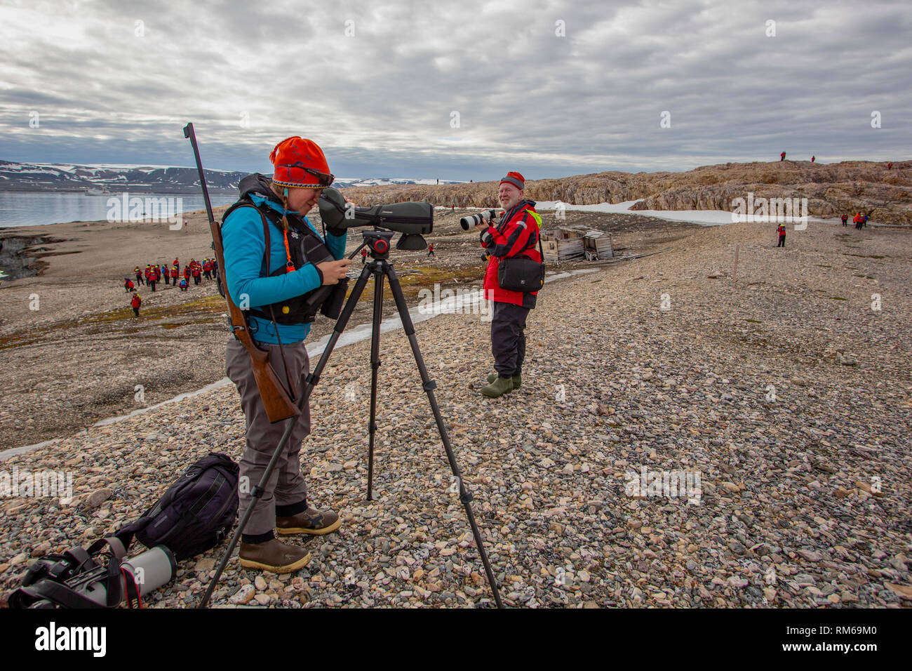 Nature researcher studies the wildlife on Spitsbergen, Svalbard, Norway ...