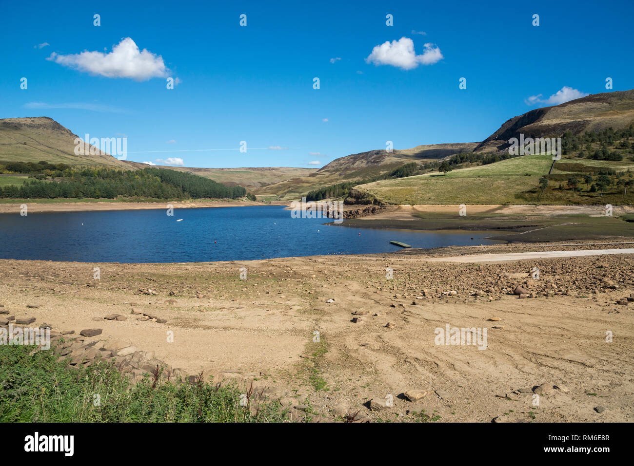 Dove Stone reservoir at low levels during the drought of 2018. Greenfield, Greater Manchester, England. Stock Photo