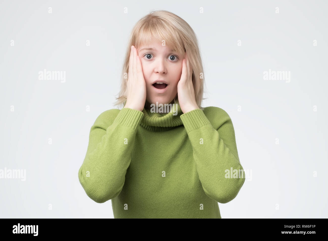 Shocked beautiful blonde woman surprise hi-res stock photography and ...