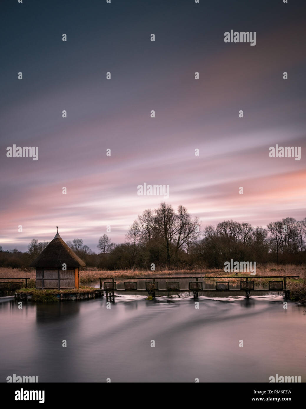 English river sunrise, The Bunny, Stockbridge, Hampshire, UK Stock Photo