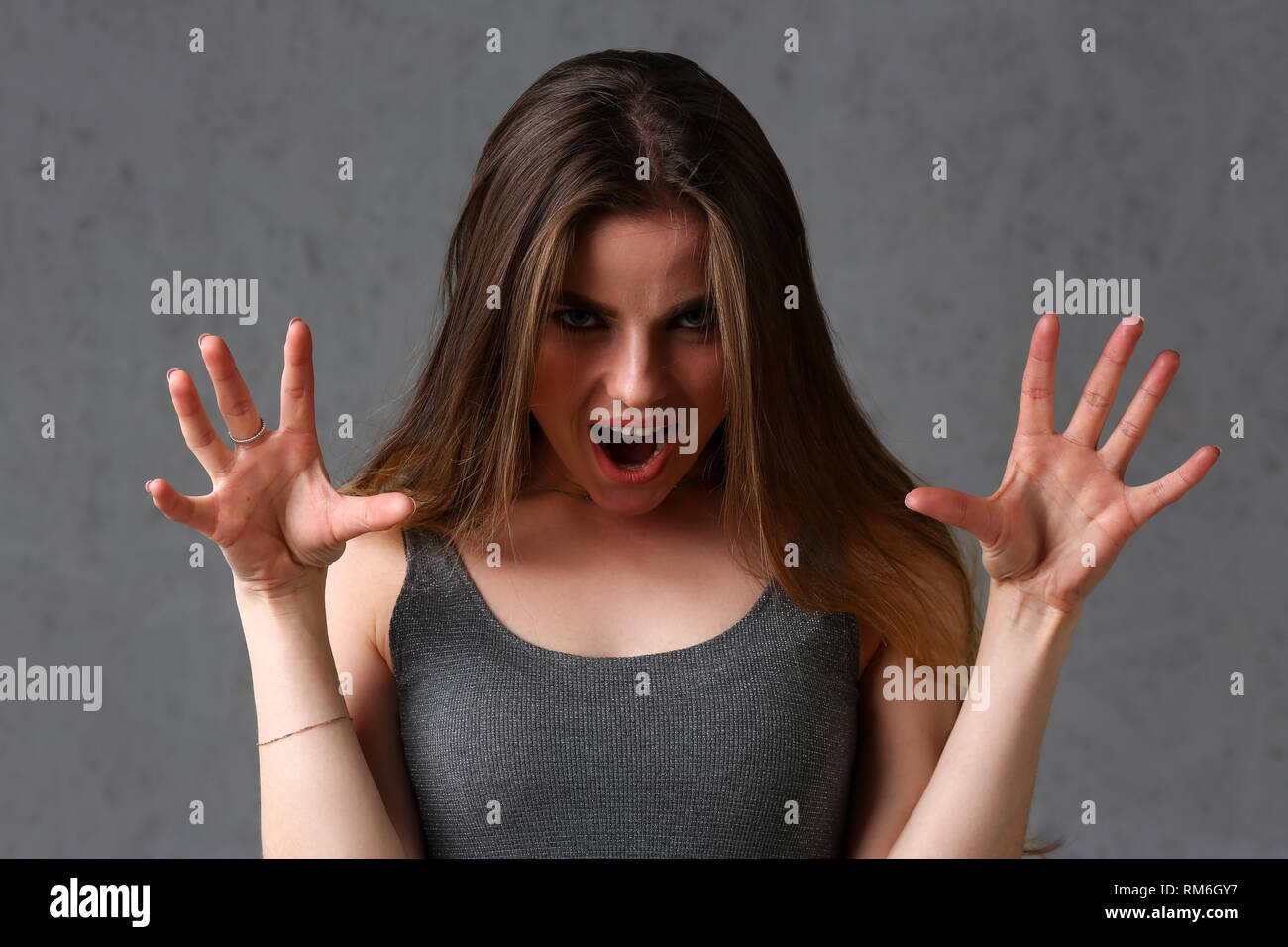 Beautiful young smiling brunette girl Stock Photo - Alamy
