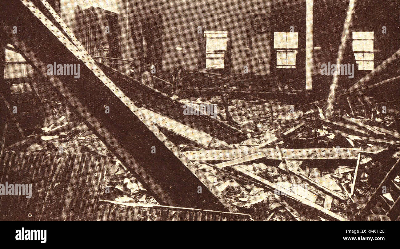 WWI - Daytime 1917 aerial bomb damage from a Zeppelin at the General Post Office (telegraph Office) London, UK - From a publication of the time Stock Photo