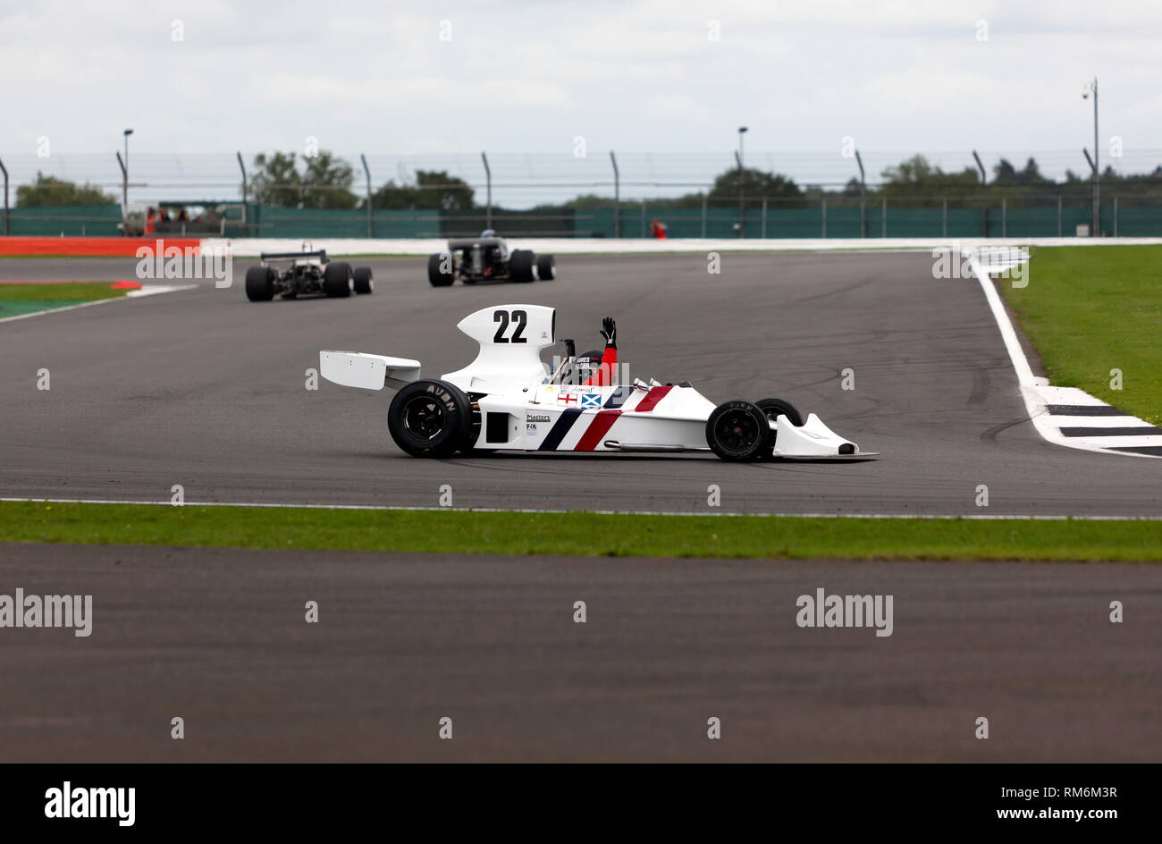 James Hagan spins out whilst driving a 1974, Hesketh 308B, during the FIA Masters Historic Formula One Race at the 2017, Silverstone Classic Stock Photo