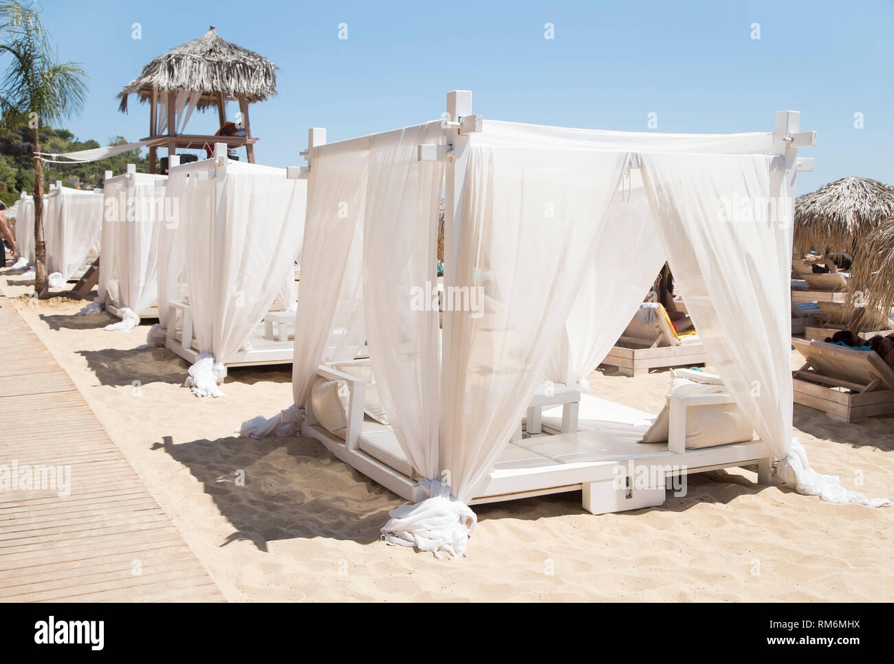 White canopies on a beach Stock Photo Alamy