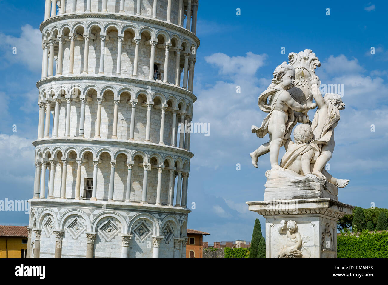 Close view of Pisa Tower and Putti Fountain. Popular touristic spot of Italy. Stock Photo
