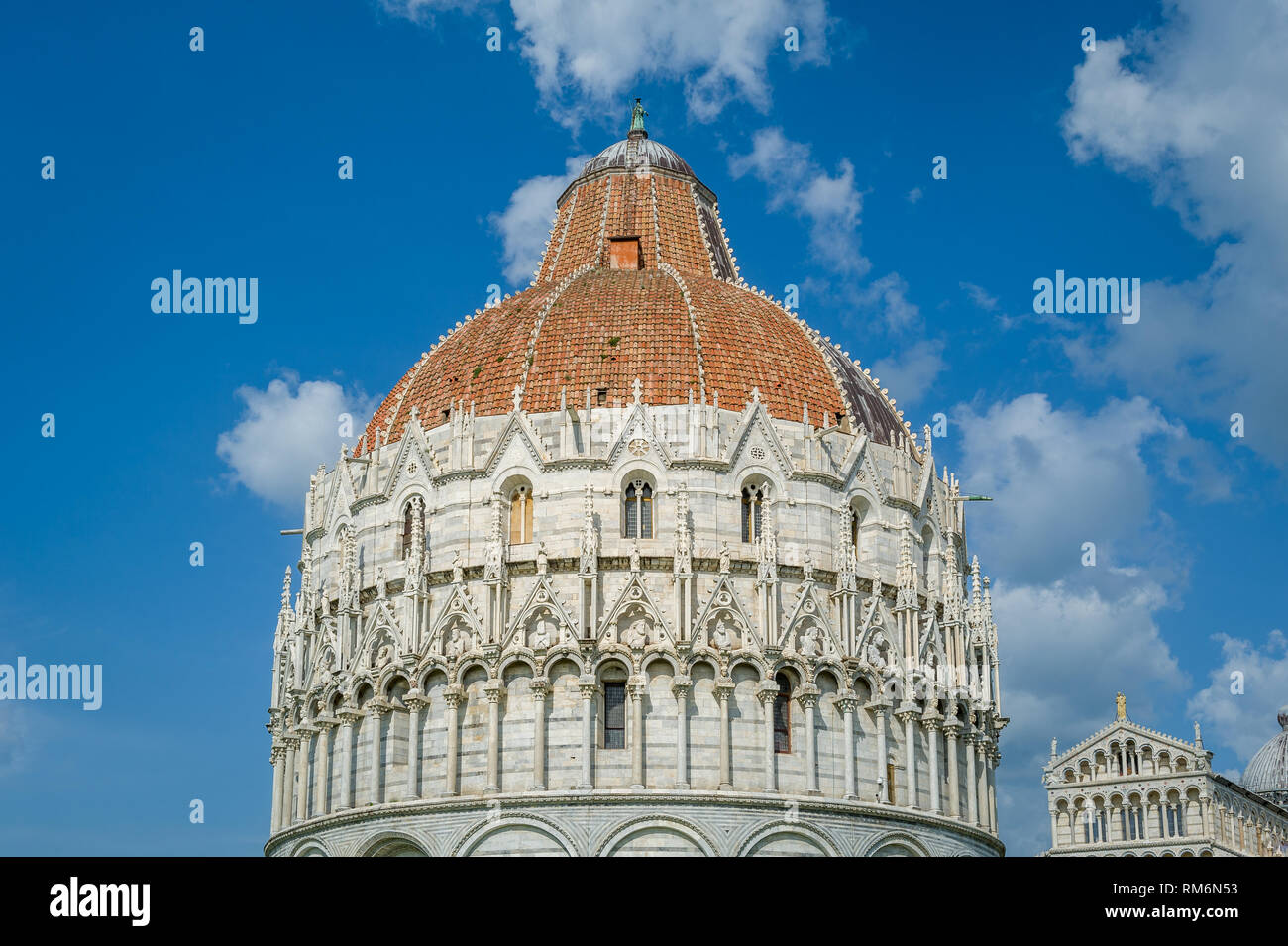 Pisa Baptistery historic tower with lots of decoration at it's walls. Toscana, Italy Stock Photo
