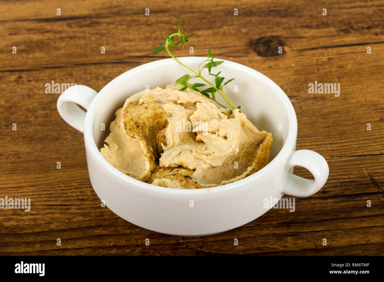 Vegetarian Humus with sesame seeds and thyme leaves Stock Photo Alamy