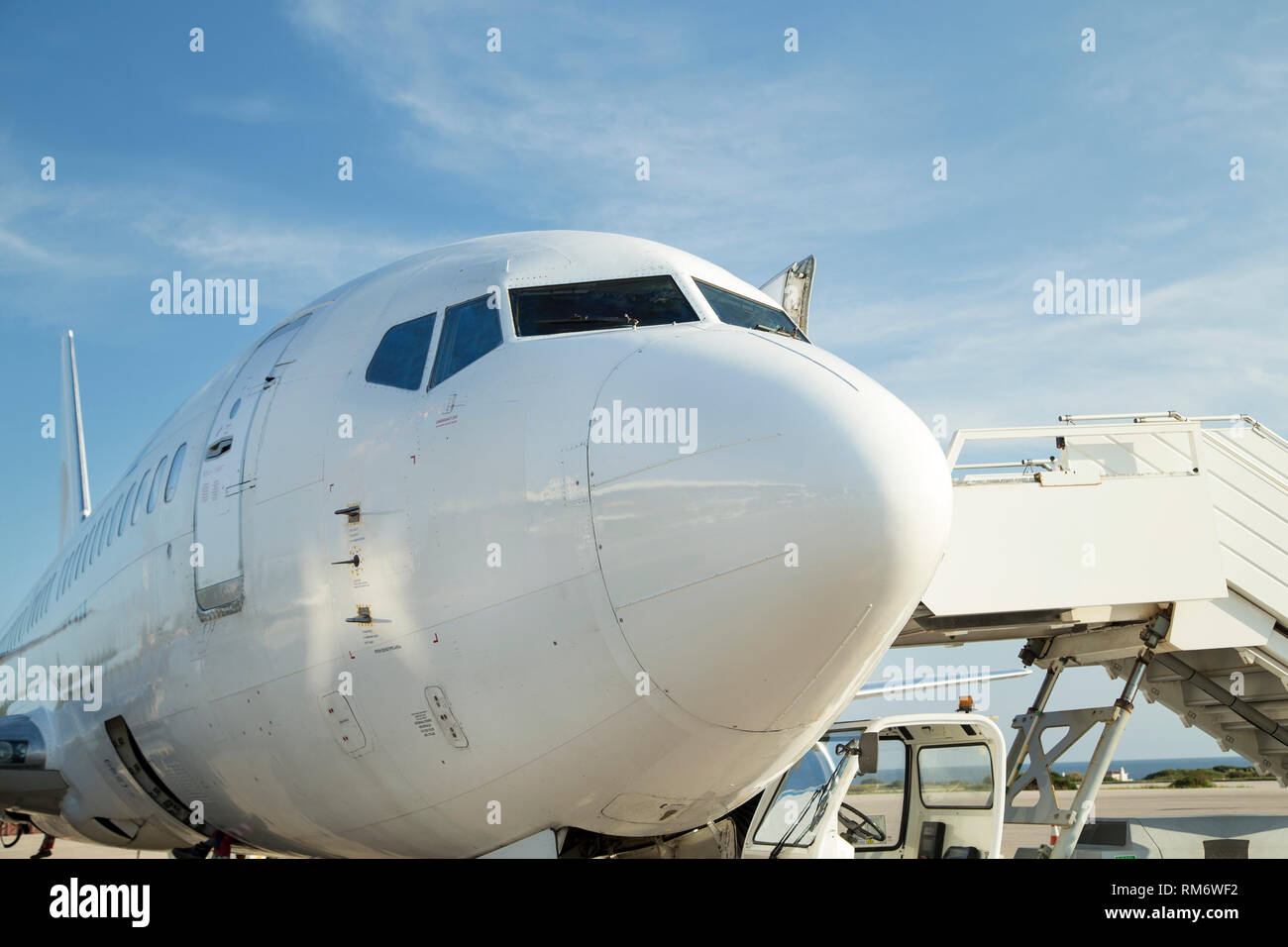 Airplane parked at the airport Stock Photo - Alamy