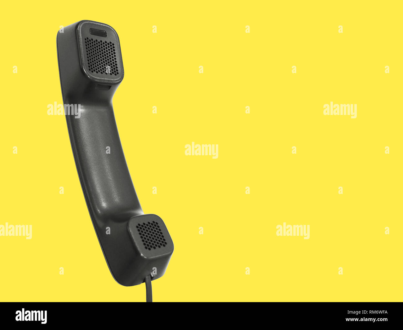 Black telephone receiver isolated on a pastel yellow background with ad