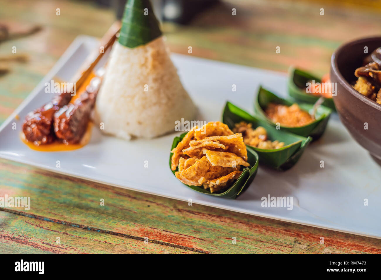 Lifestyle food. A dish consisting of rice, fried fish with wood