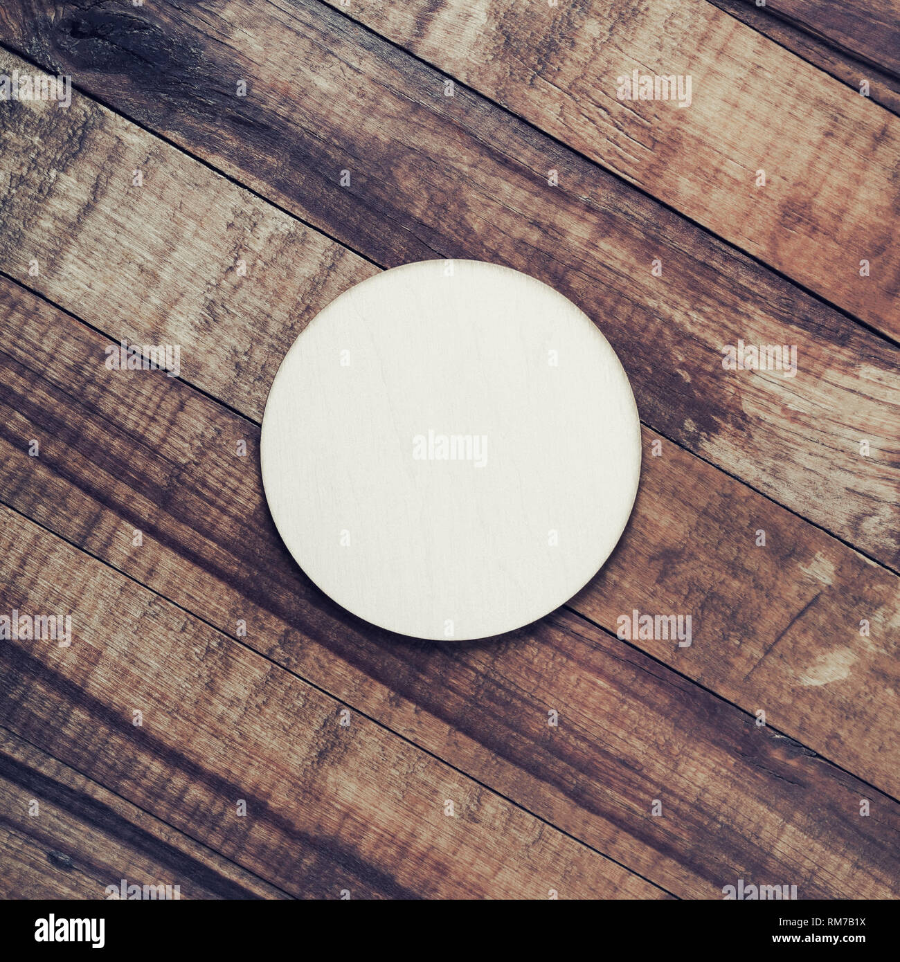 Blank beer coaster on vintage wooden background. Flat lay Stock Photo -  Alamy