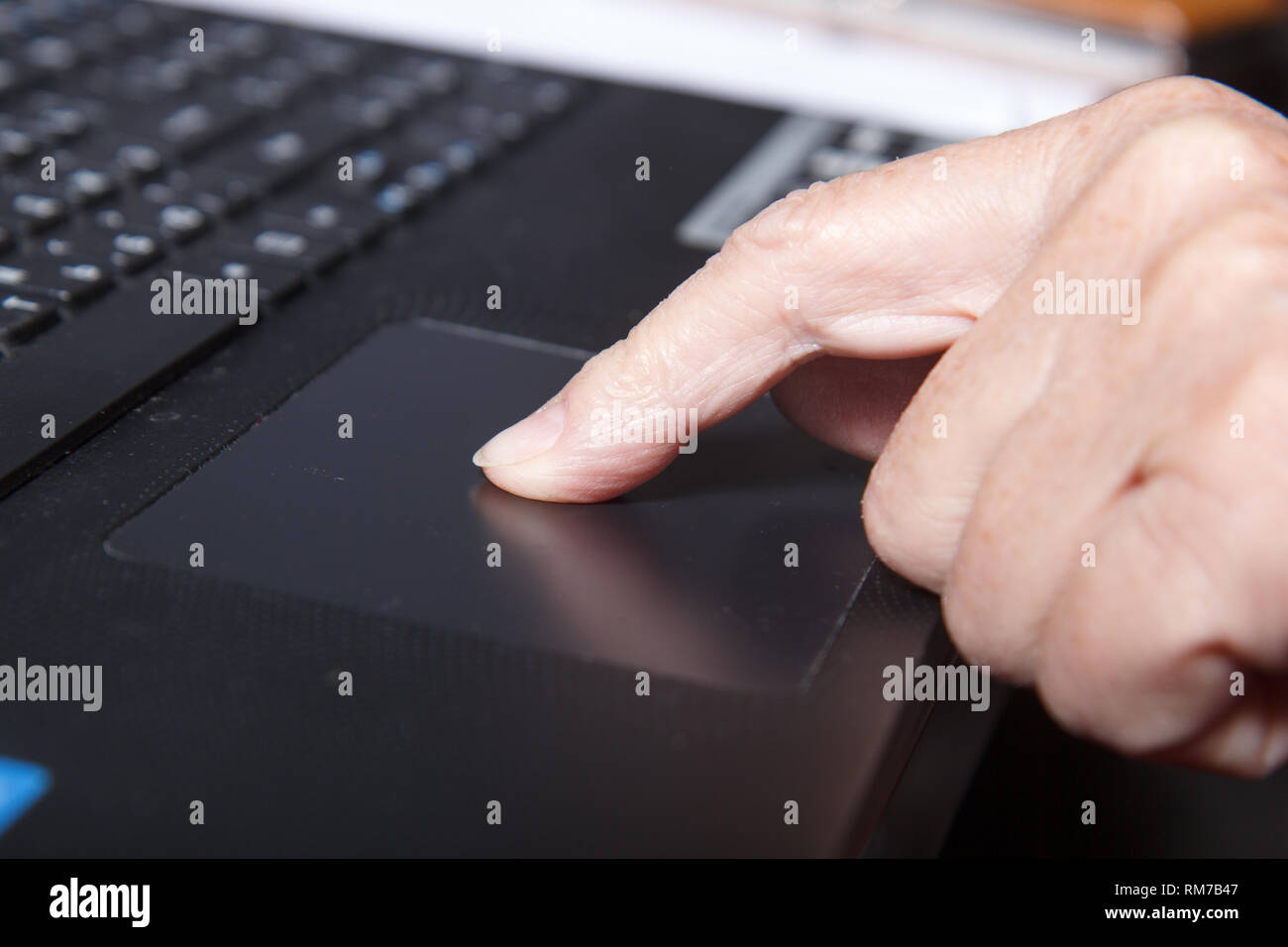 old woman usin laptop Stock Photo