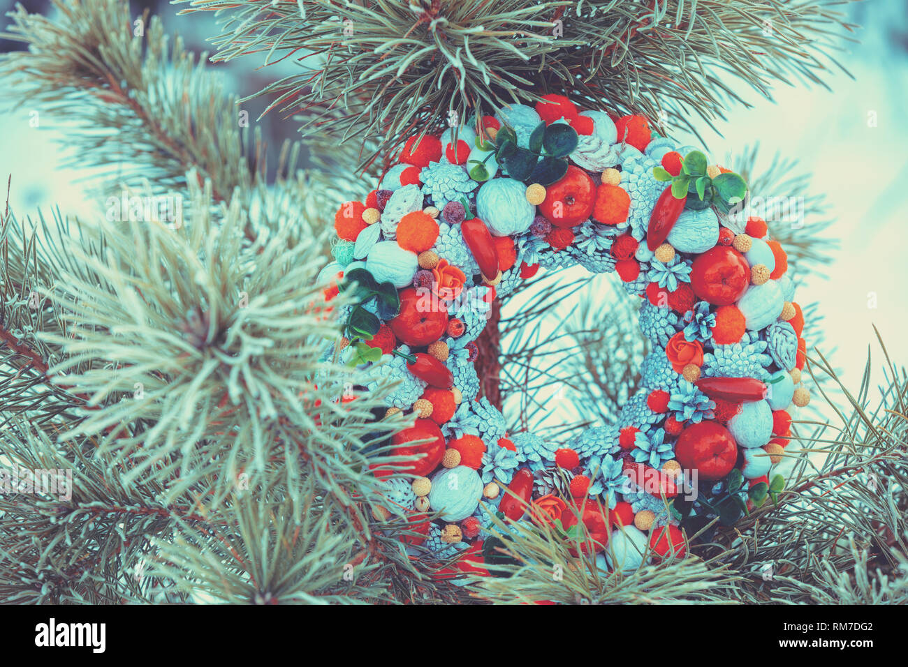 Pine branches and Christmas wreath background Stock Photo