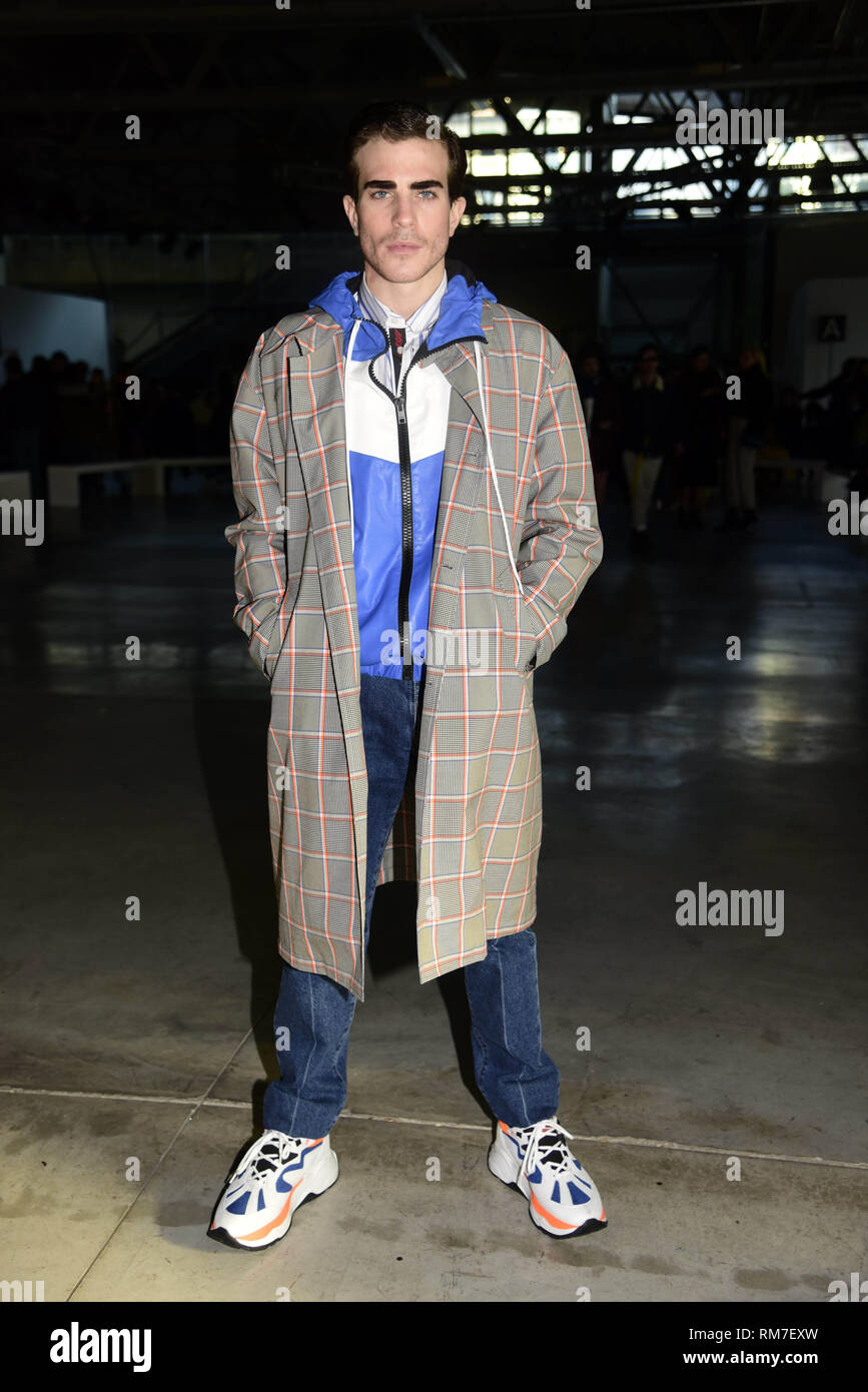 Guests arrive for the Moda Uomo fashion show during Milan Fashion