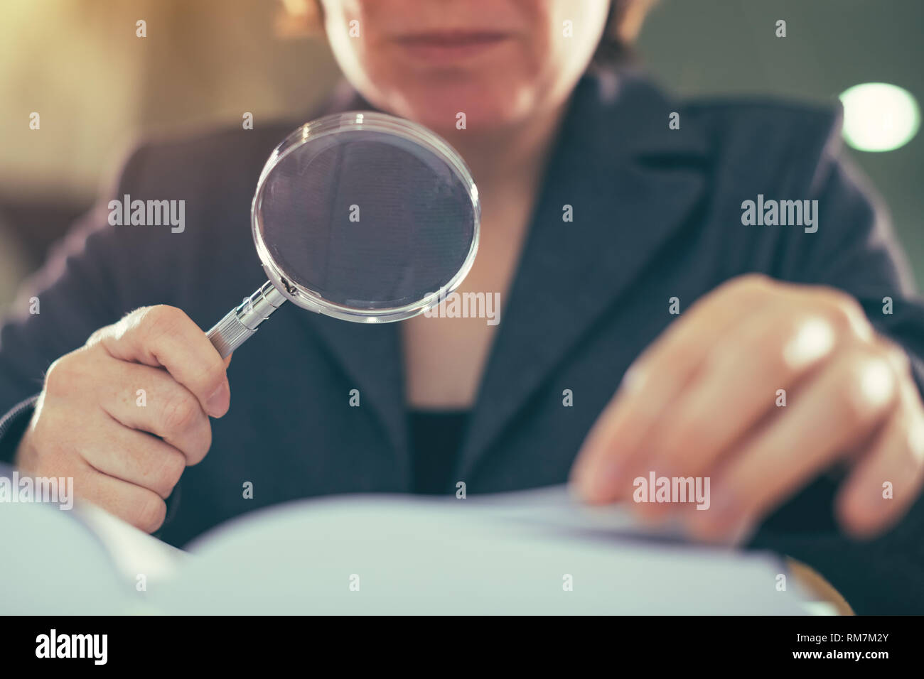 Business corruption audit inspection concept, female inspector using