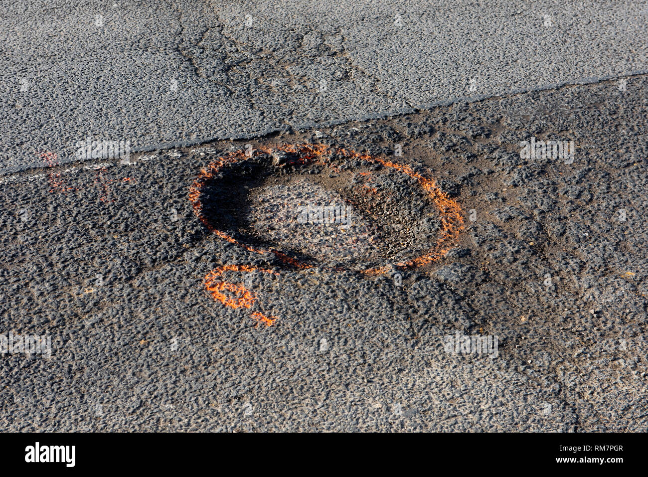 Pot Holes or Potholes on Newbiggen Street, Thaxted Essex England UK