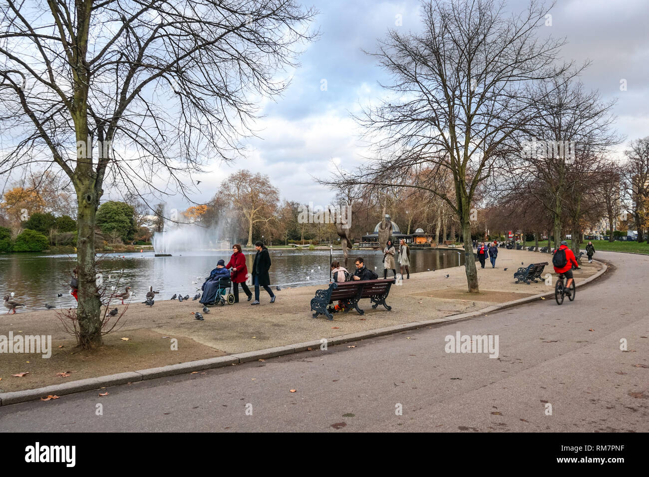 People in Victoria Park during winter, London England United Kingdom UK Stock Photo
