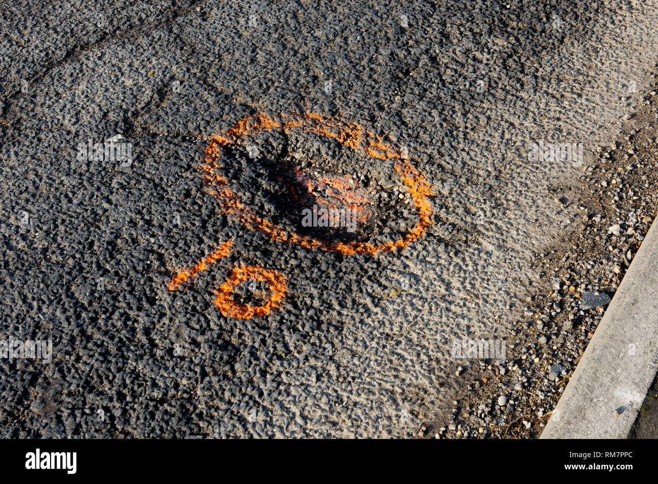 Pot Holes or Potholes on Newbiggen Street, Thaxted Essex England UK