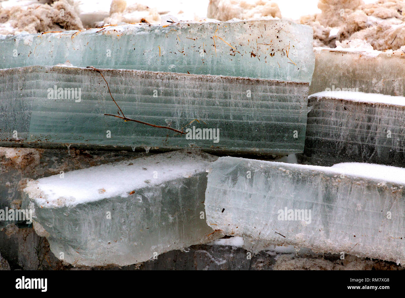 Thick ice slabs on Grand River Cambridge Ontario Canada. Stock Photo