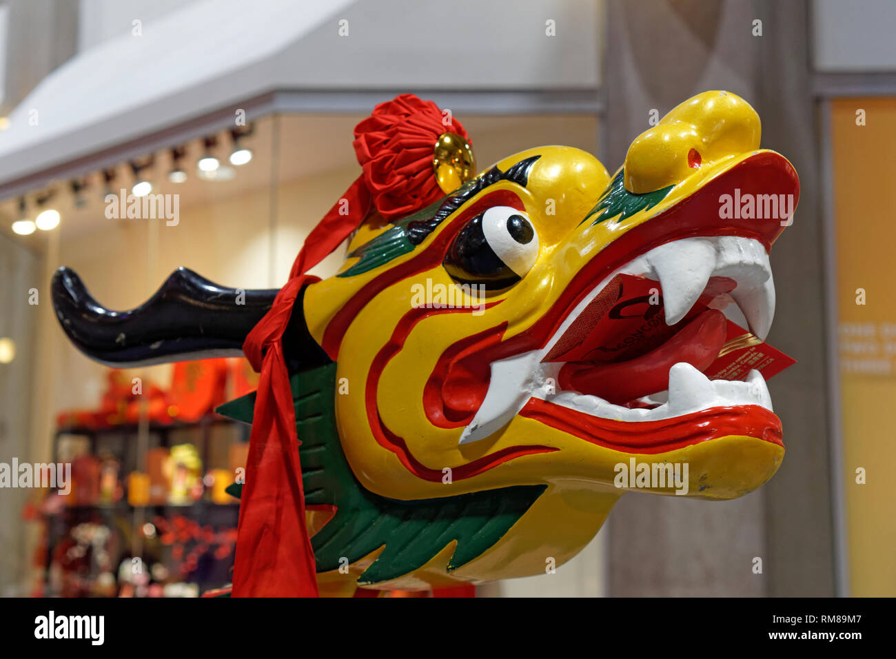 Close-up of wooden dragon head at Year of the Pig 2019 Chinese New Year celebrations at International Village Mall, Chinatown, Vancouver,  BC, Canada Stock Photo