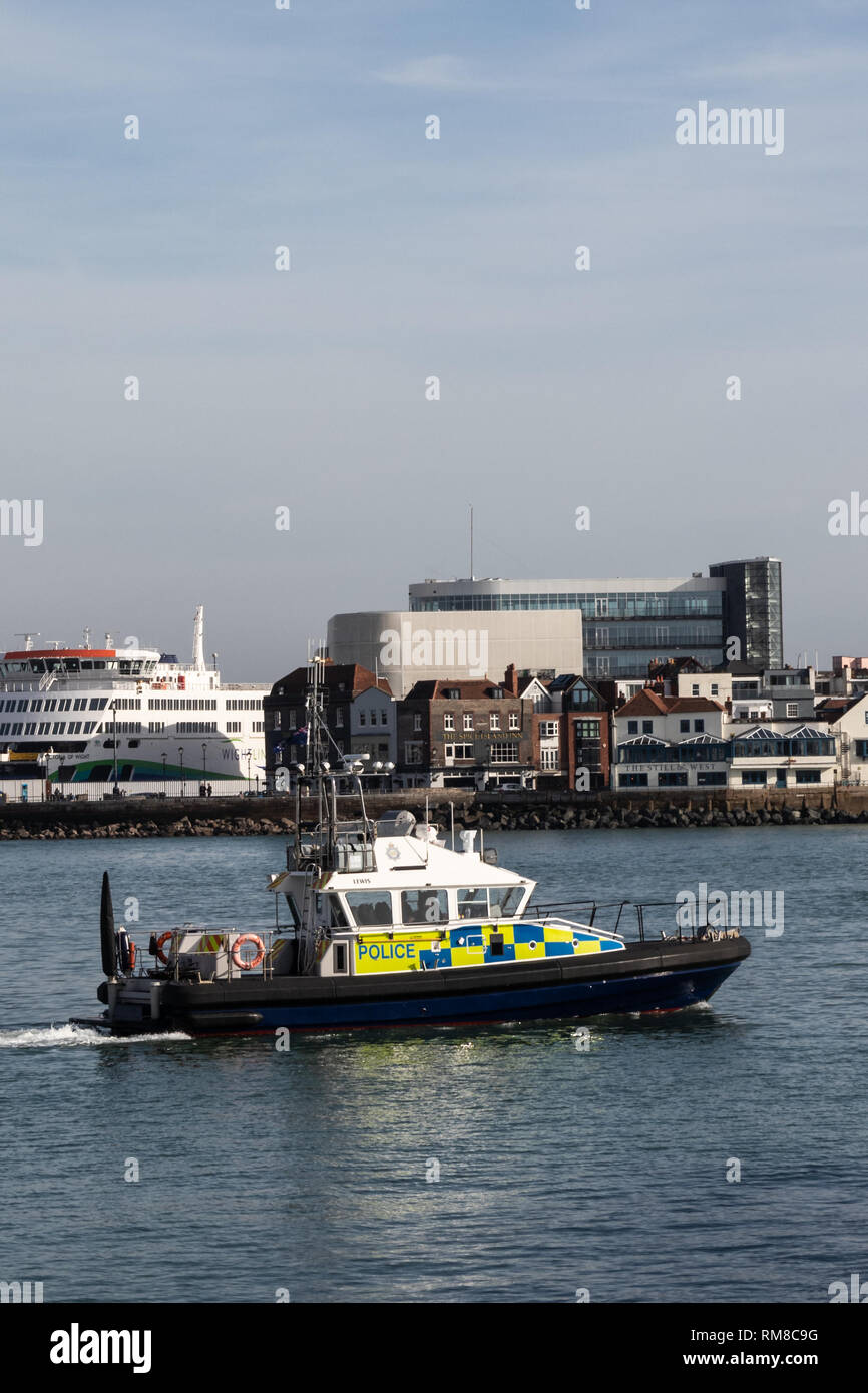 British Police boat at sea patrolling a harbour Stock Photo