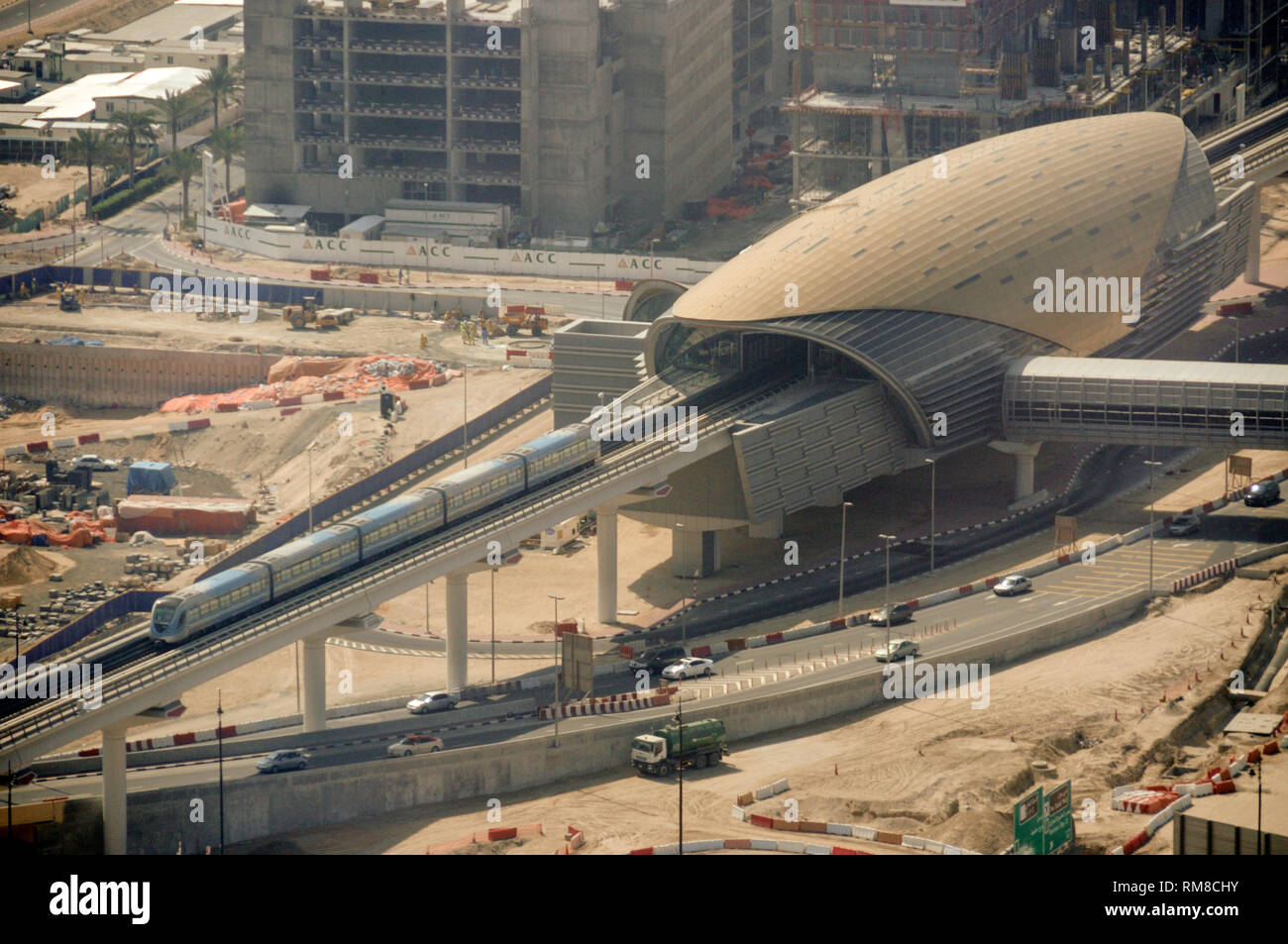 A metro leaving Burj Khalifa metro station in downtown    Dubai in the United Arab Emirates, (UAE) Stock Photo