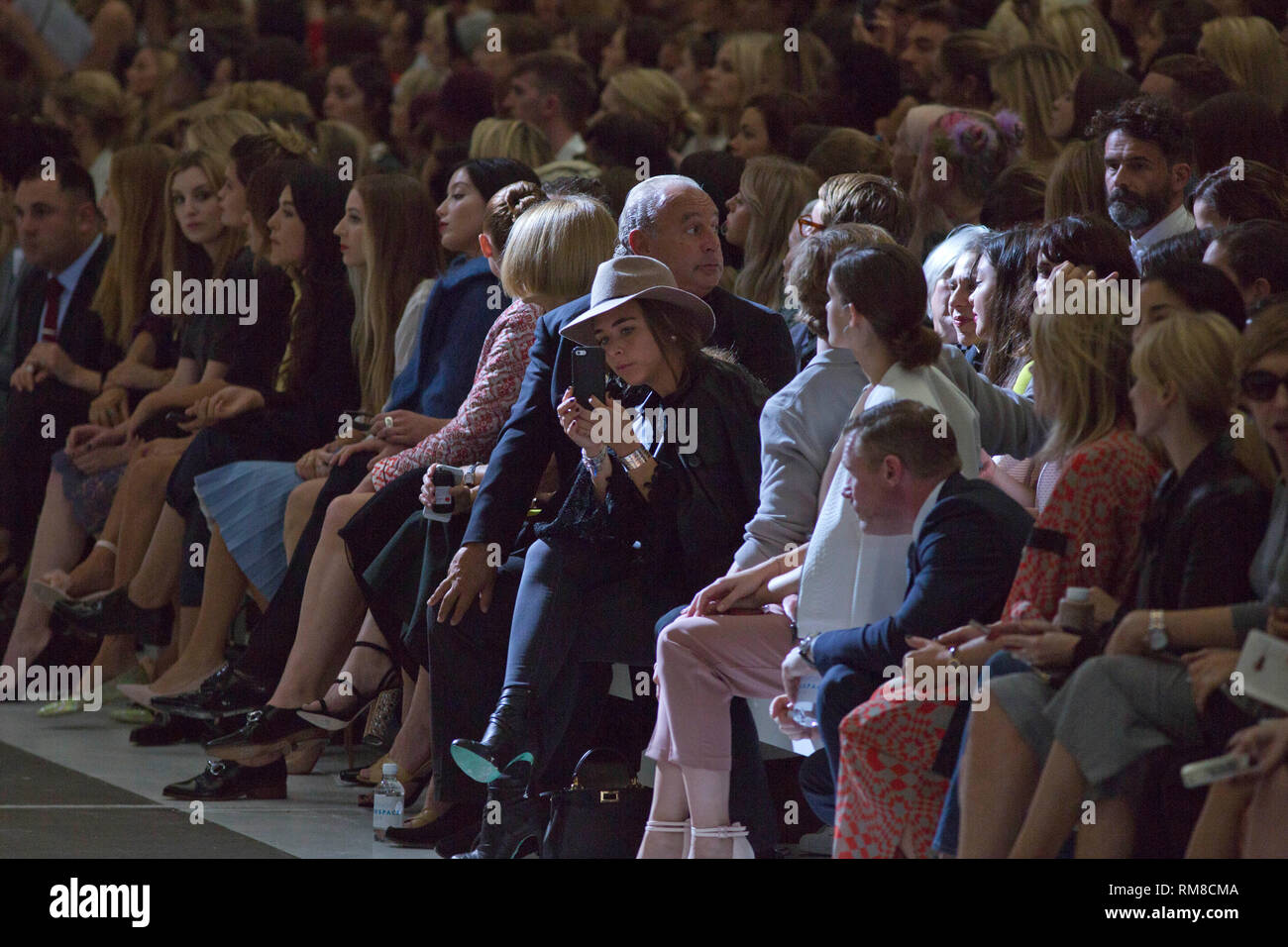 Sir Philip Green and daughter Chloe Green seen at the Topshop catwalk show in London during London Fashion Week. 14 September 2014. Stock Photo