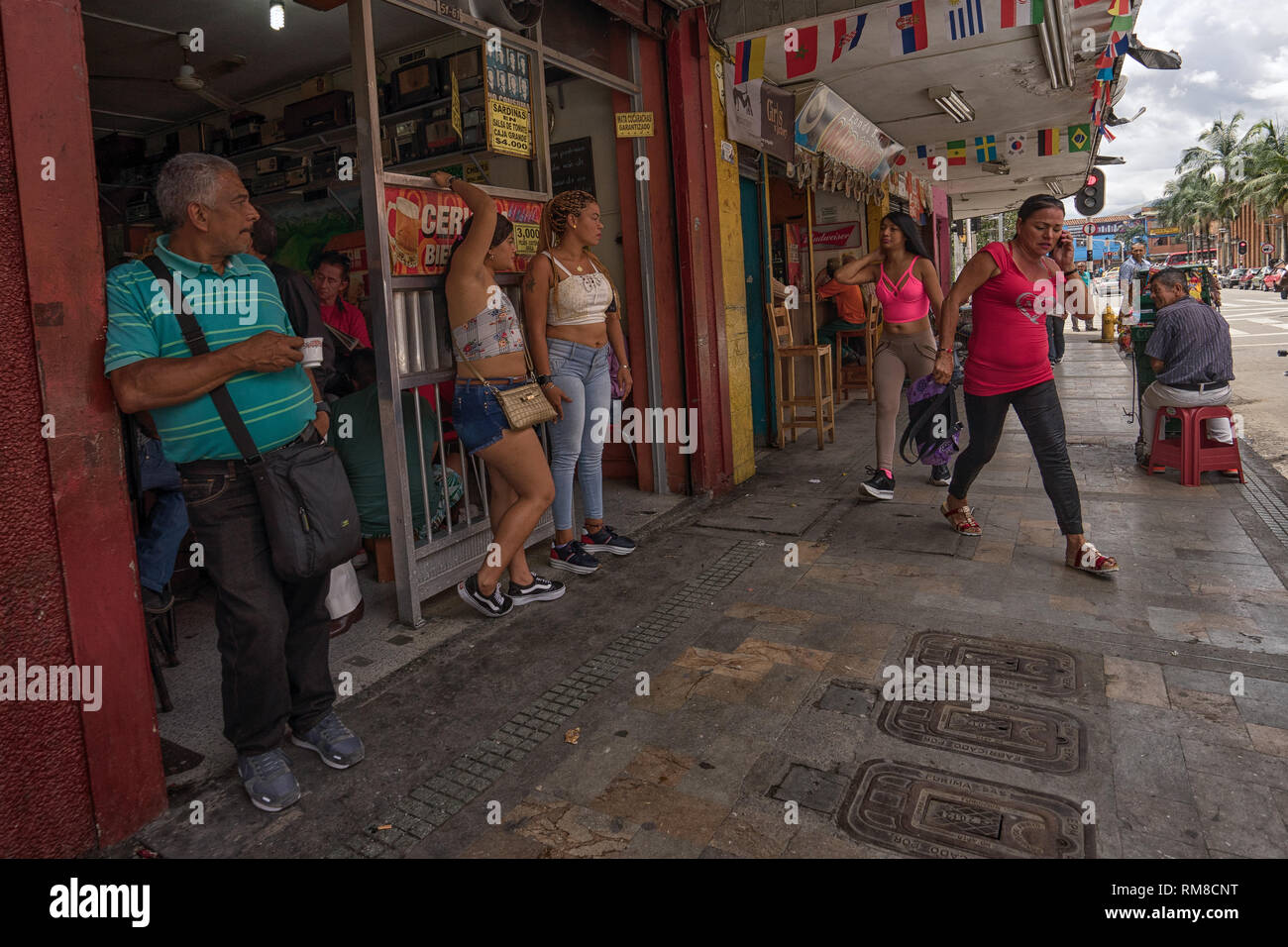 Medellin, Colombia - July 27, 2018:people on the street in the La Candelaria red light district Stock Photo