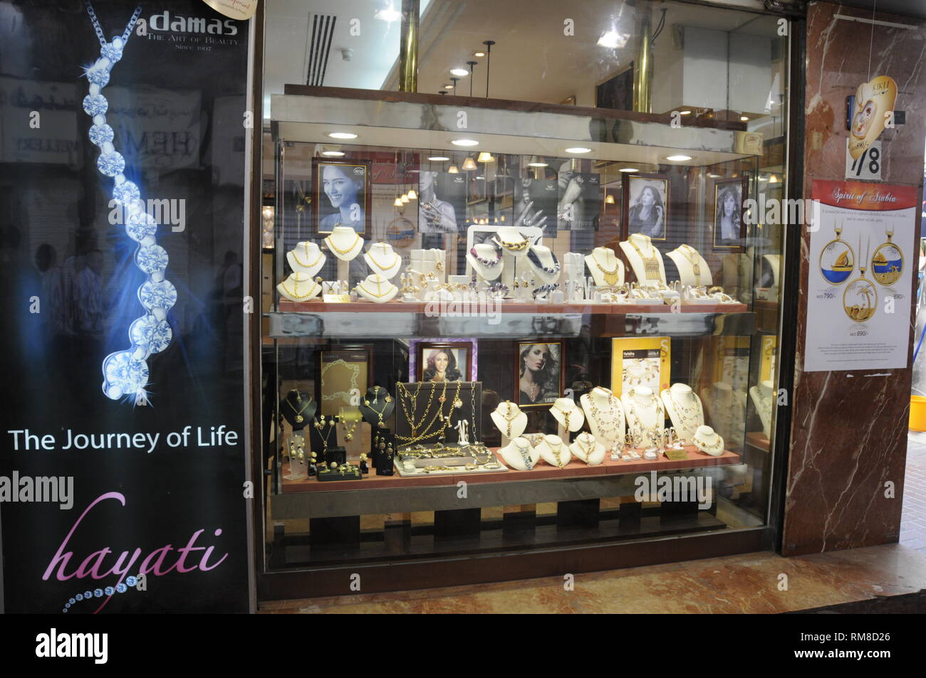 A jewellerÕs shops window display at the Dubai Gold Souk in the