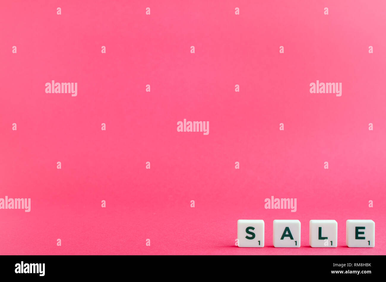 Word SALE on pink background. Online shopping concept Black Friday and Ciber Monday. Copy space. Stock Photo