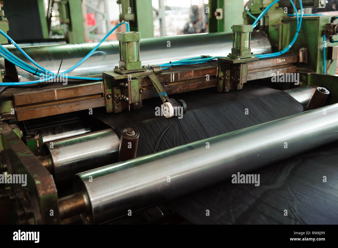 The process of rolling rubber Stock Photo Alamy