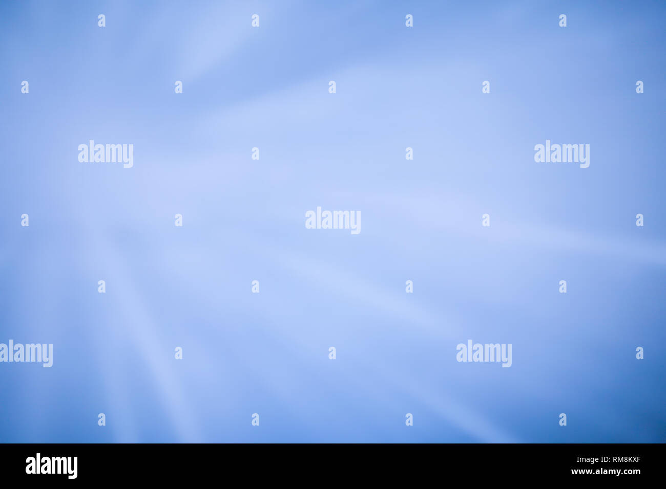 Sparkling glowing starburst background. Abstract light speed motion explosion blur texture. Stock Photo