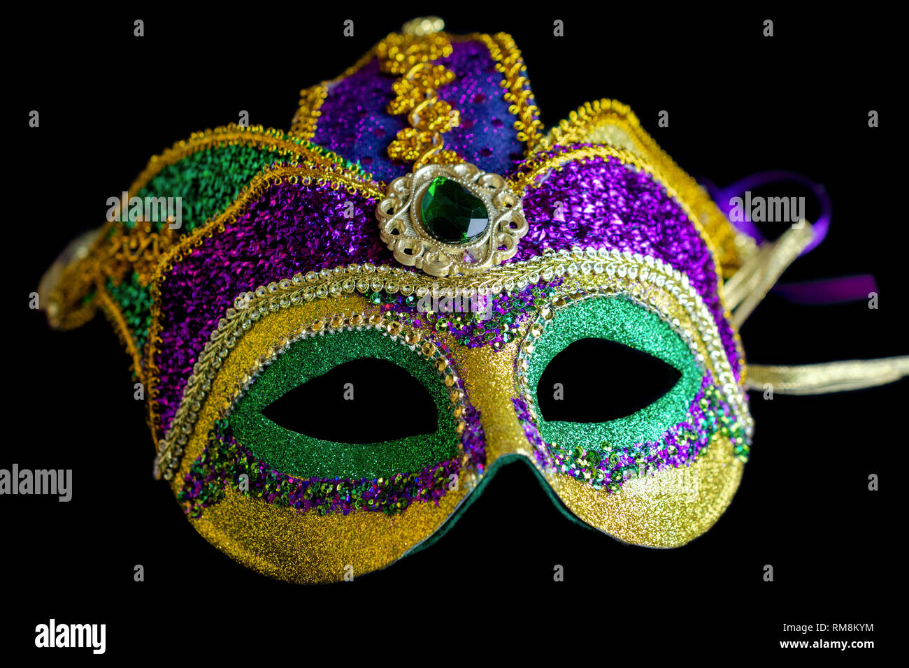 Jester mask front view with a black background.  Close up. Stock Photo