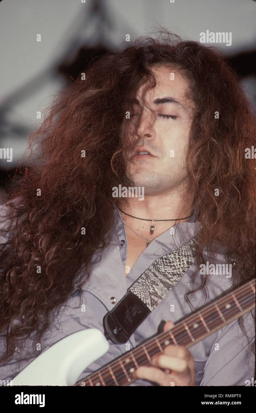 Badlands guitarist Jake E. Lee is shown soloing during s concert