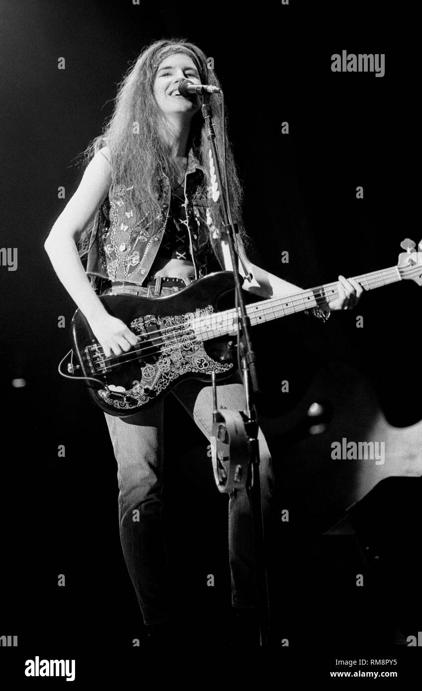 Bassist and vocalist Michael Steele of The bangles is shown performing onstage during a 'live' concert appearance Stock Photo