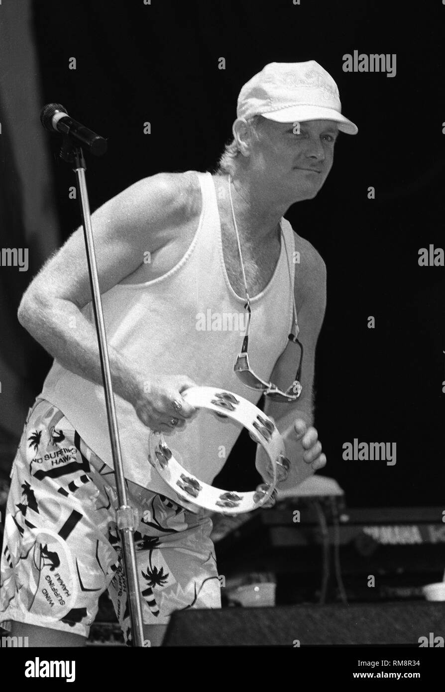 Singer Mike Love of the Beach Boys is shown performing on stage during
