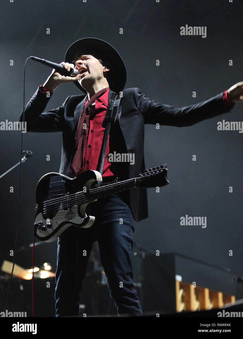 Beck is shown performing on stage during a 'live' concert appearance. Stock Photo