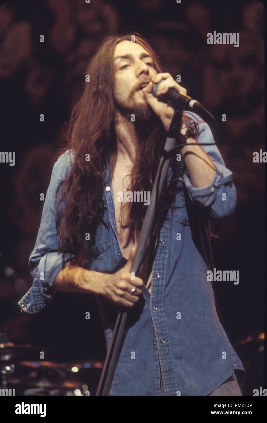 Black Crowes singer Chris Robinson is shown singing on stage during a ...