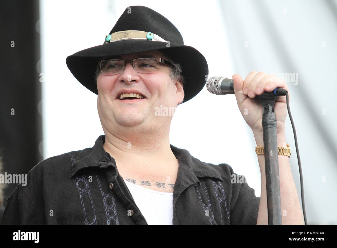 Singer and harmonica player John Popper is shown performing on stage during  a "live" concert appearance with Blues Traveler Stock Photo - Alamy