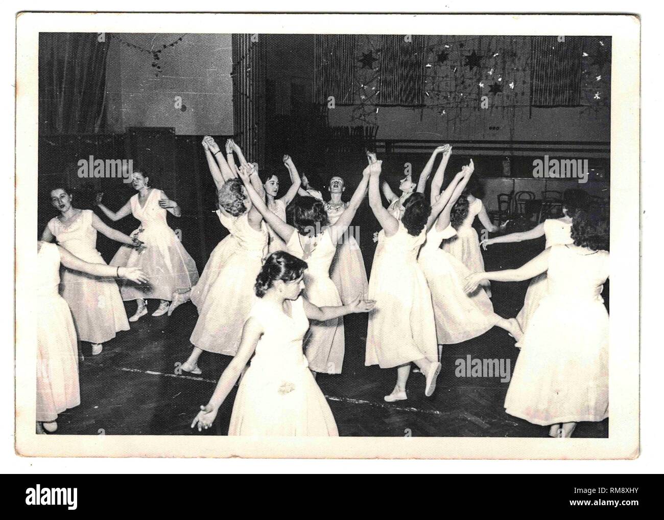 Retro photo shows female dancers. Female dancing club. Black and white
