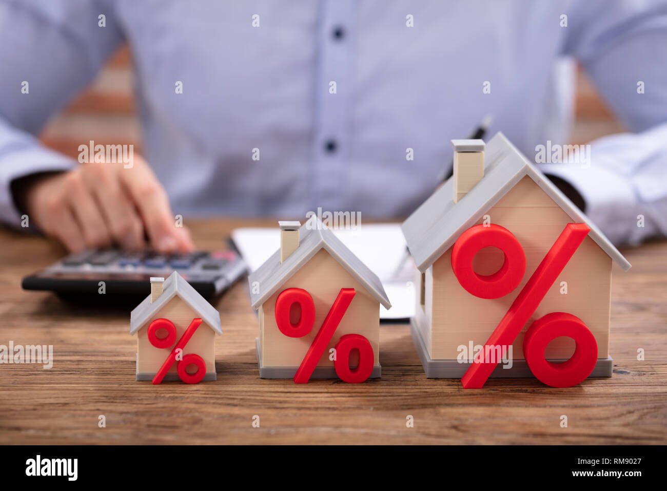 Closeup Of A House Models With Percentage Symbol In Front Of