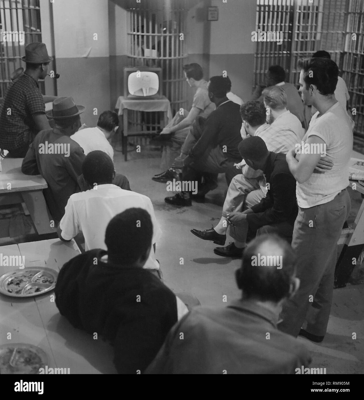 Inmates at Cook County Jail in Chicago watch the 1960 debate between Richard Nixon and John F. Kennedy. Stock Photo