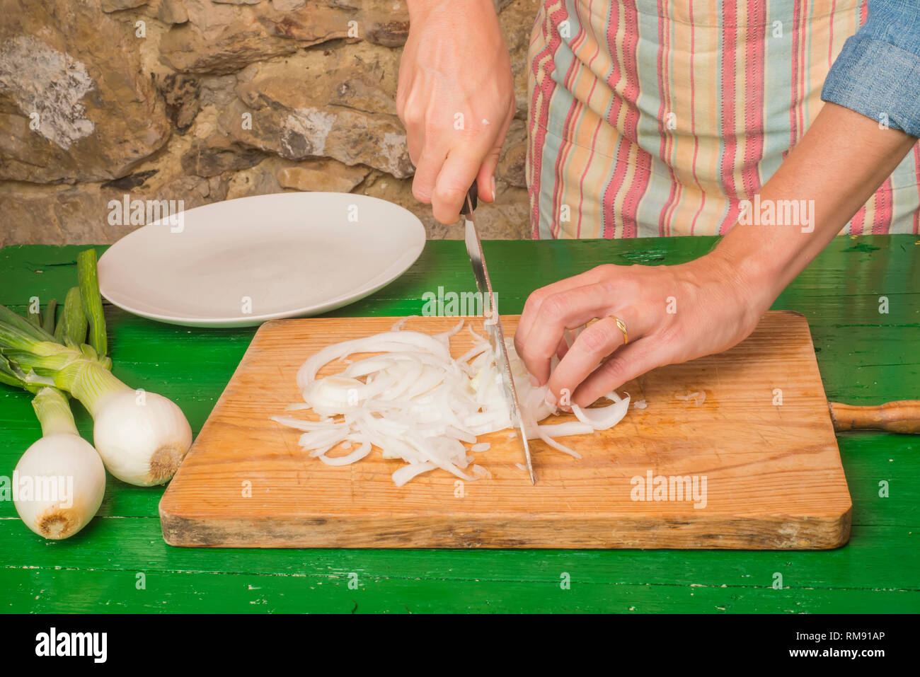 Cutting onions in tears hi-res stock photography and images - Alamy