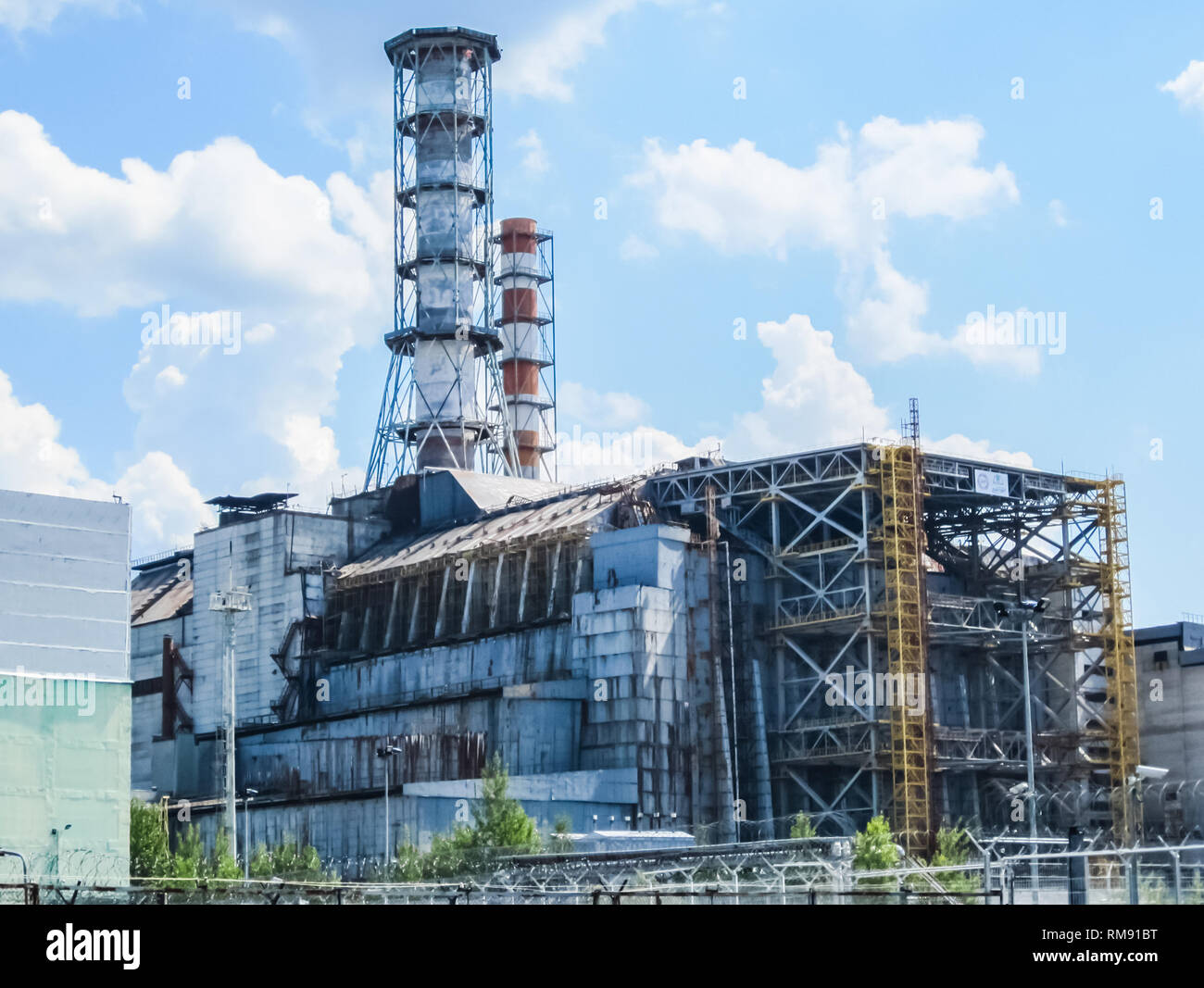 Chernobyl nuclear power plant, view from a distance on the station and the sarcophagus. Stock Photo
