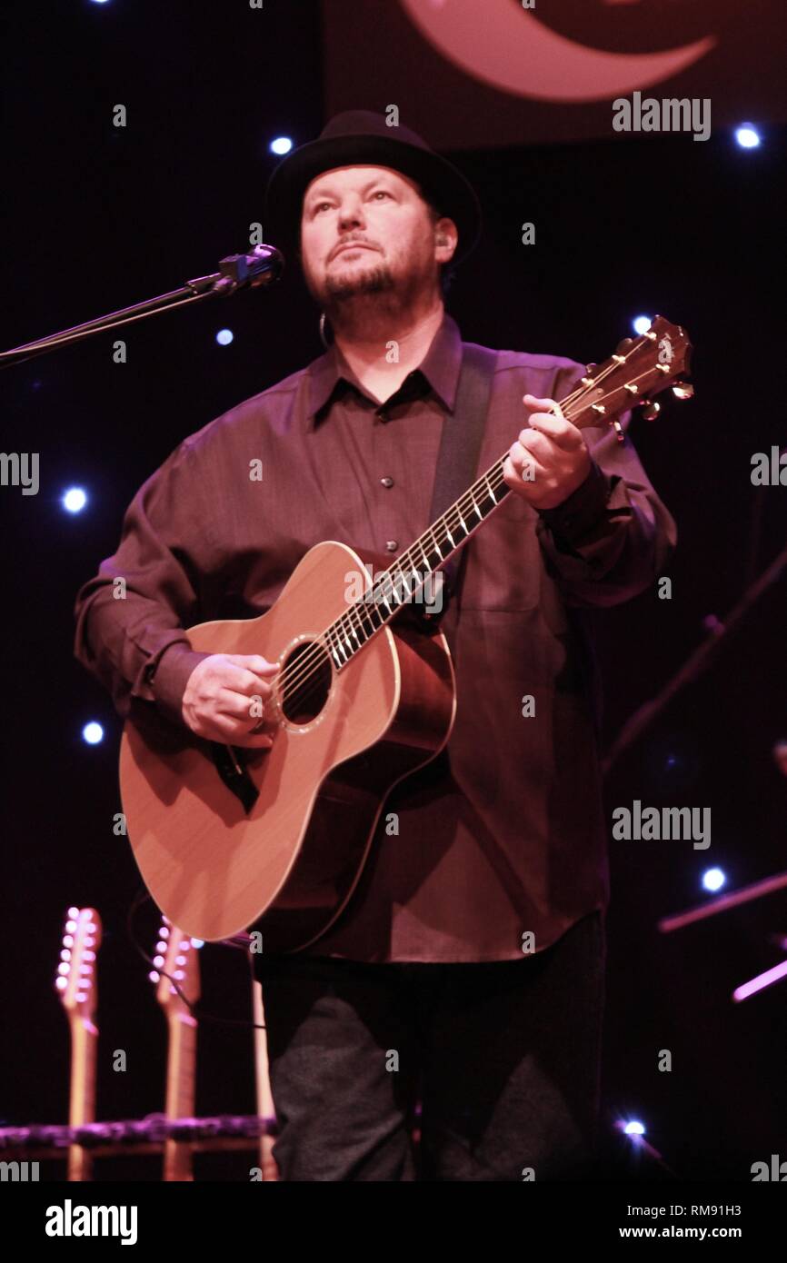 Singer, songwriter and guitarist Christopher Cross is shown performing on stage during a 'live' concert appearance. Stock Photo