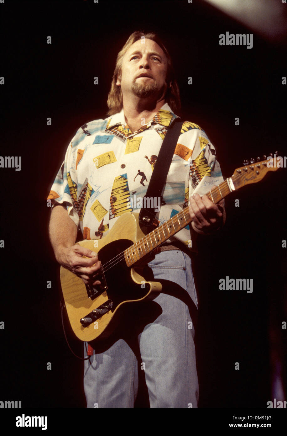 Stephen Stills of Crosby, Stills and Nash is shown performing "live" in