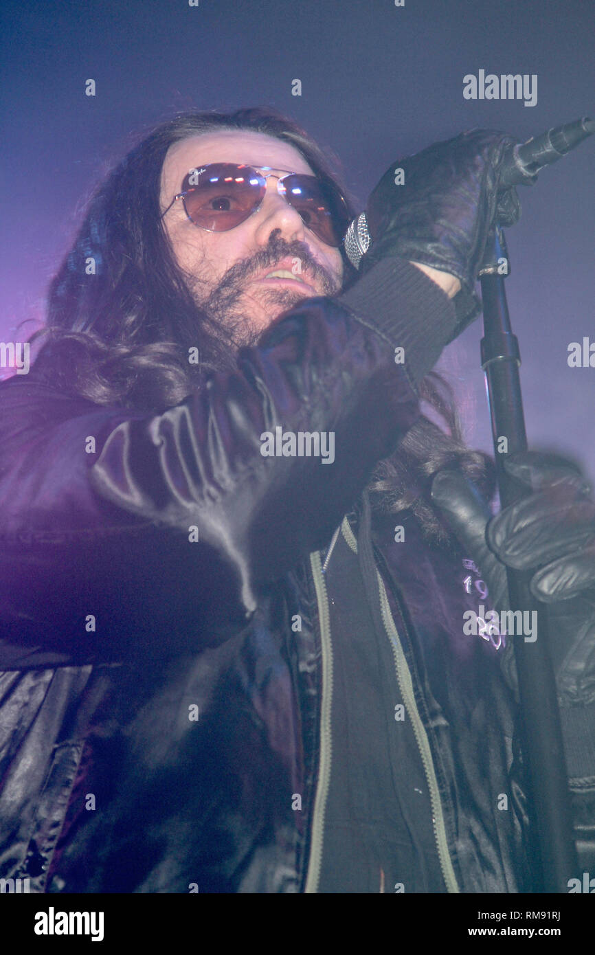 Vocalist Ian Astbury of The Cult is shown performing on stage during a concert appearance. Stock Photo