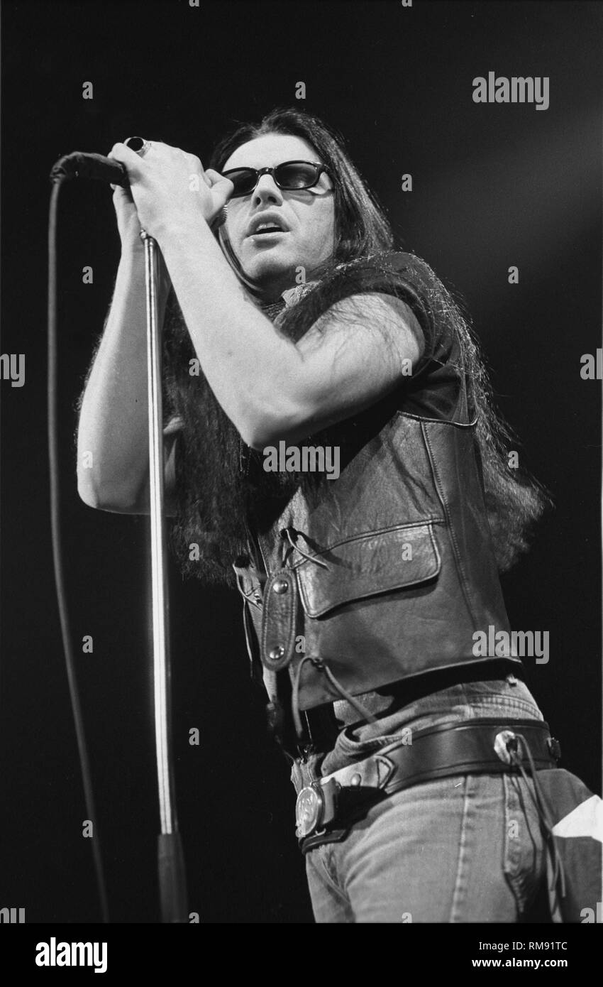 Vocalist Ian Astbury of The Cult is shown performing on stage during a concert appearance. Stock Photo